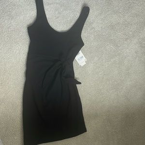 Black Zara mini dress with tie. Never worn. Size M. Tags on